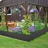 A garden scene with a wooden pergola, outdoor furniture, and various plants, bordered by a dark fence. Produktbild-Vorschau