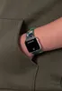 A close-up shot of a person's arm wearing a Minecraft-themed smartwatch. Podgląd zdjęcia produktu