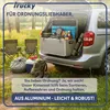 Camping gear packed in the back of a car. Produktbild-Vorschau