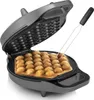 A bubble waffle maker with a waffle being cooked inside, and a fork is being used to remove it. Produktbild-Vorschau