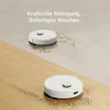Two white robot vacuum cleaners are shown on different floor surfaces. One is on a tiled floor with spilled liquid, and the other is on a wooden floor with debris. Voir les images du produit