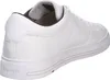 A white leather sneaker shown from the side and back. Voir les images du produit