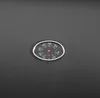 A close-up of a thermometer on a dark surface. Produktbild-Vorschau