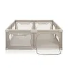 A beige playpen with mesh sides and a zippered opening. Produktbild-Vorschau
