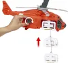 A hand is shown operating a toy helicopter, demonstrating how to attach cargo. Anteprima dell’immagine prodotto