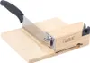 A kitchen slicer with a wooden base and a metal blade. Náhled obrázku produktu