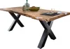 A wooden dining table with black X-shaped legs, set against a white background. Produktbild-Vorschau