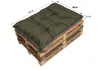 A green cushion placed on a wooden pallet. Produktbild-Vorschau