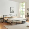 A bedroom scene with a metal bed frame, bedding, and a window. Produktbild-Vorschau