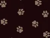 A repeating pattern of paw prints on a dark brown background. Náhled obrázku produktu