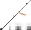 A hand is holding a black metal handrail mounted on a white background. Screws and wall anchors are displayed below the handrail. Náhled obrázku produktu