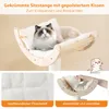 A cat is resting on a curved wooden cat hammock with a padded cushion. There are close-up views of the cushion fabric and a hand removing the cushion. Dimensions are indicated. Anteprima dell’immagine prodotto