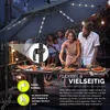 People enjoying a meal outdoors under a large umbrella with lights. Voir les images du produit