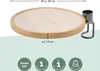 A close-up view of a round plant saucer with a metal holder, accompanied by informational graphics and text. Produktbild-Vorschau