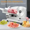 A food slicer is shown with meat, kiwi slices, ham, and cheese. Produktbild-Vorschau