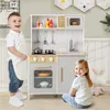 Two children playing with a toy kitchen. Podgląd zdjęcia produktu