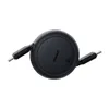 A black retractable USB-C to USB-C cable is shown coiled in a circular housing. Náhled obrázku produktu