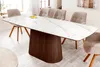 A dining table with chairs in a dining room. Produktbild-Vorschau
