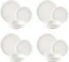 Four sets of white ceramic plates and bowls arranged in a grid. Voir les images du produit