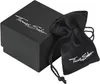 A black gift box and a black drawstring pouch, both with the Thomas Sabo logo, are displayed. Podgląd zdjęcia produktu