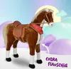 A plush toy horse with a saddle and bandana, set against a pastel, cloud-like background. Podgląd zdjęcia produktu