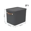 A 3D rendering of a gray storage box with a brown handle and lid, with dimensions indicated. Produktbild-Vorschau