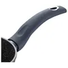 Close-up of a frying pan handle and part of the pan. Produktbild-Vorschau