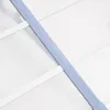 A close-up view of a gray and transparent door canopy, showing the polycarbonate material and support structure. Náhled obrázku produktu