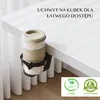 A coffee cup holder attached to the side of a white table. Podgląd zdjęcia produktu