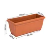 A rectangular terracotta-colored planter box with dimensions indicated by measurement lines and text. Náhľad obrázku produktu
