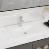 A close-up view of a white ceramic bathroom sink with a chrome faucet. Produktbild-Vorschau