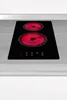 A black electric cooktop with two red-hot heating elements sitting on a countertop. Produktbild-Vorschau