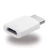 A white USB-C to Micro USB adapter is shown against a white background. Podgląd zdjęcia produktu