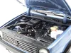 Close-up view of a model car engine bay. Produktbild-Vorschau