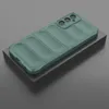A green phone case is displayed on a dark gray block against a gray background. Produktbild-Vorschau