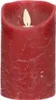 A close-up, studio shot of a red LED candle with a flickering flame. Podgląd zdjęcia produktu
