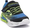 A single child's sneaker is shown from a side angle against a white background. Voir les images du produit