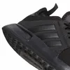 A close-up view of the heel and sole of a black Adidas sneaker. Podgląd zdjęcia produktu