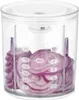 A close-up shot of a clear plastic food chopper container filled with sliced red onions. Measurement markings are visible on the side of the container. Produktbild-Vorschau
