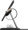 A side view of a Belkin Boost Charge Pro 3-in-1 wireless charger holding an iPhone, Apple Watch, and AirPods Pro charging case. Produktbild-Vorschau