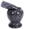 A stone mortar and pestle set on a white background. Voir les images du produit