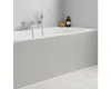 A close-up view of a bathtub faucet and showerhead mounted on a wall above a bathtub with a grey panel. Produktbild-Vorschau