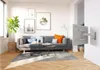 A modern living room with a sofa, coffee tables, and a TV wall mount. Voir les images du produit