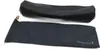 Two black fabric pouches are laid out on a white background. One pouch is cylindrical and lies horizontally above a flatter, longer pouch. Anteprima dell’immagine prodotto