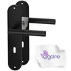 A pair of black door handles with a keyhole mechanism, presented on a white background with a small white cloth featuring a logo. Produktbild-Vorschau
