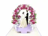 biglietto di matrimonio pop-up 3D con arco di fiori di rosa Anteprima dell’immagine prodotto 2