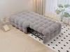 A gray modular sofa bed is partially extended, revealing its metal frame, in a well-lit room with a patterned rug and a plant. Produktbild-Vorschau