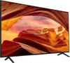 A television set displaying a landscape image. Produktbild-Vorschau