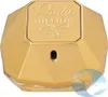A gold-colored perfume bottle with the brand name 'Lady Million' embossed on the top. Produktbild-Vorschau