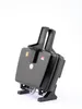 A black waffle iron is shown tilted on a white background. Náhled obrázku produktu